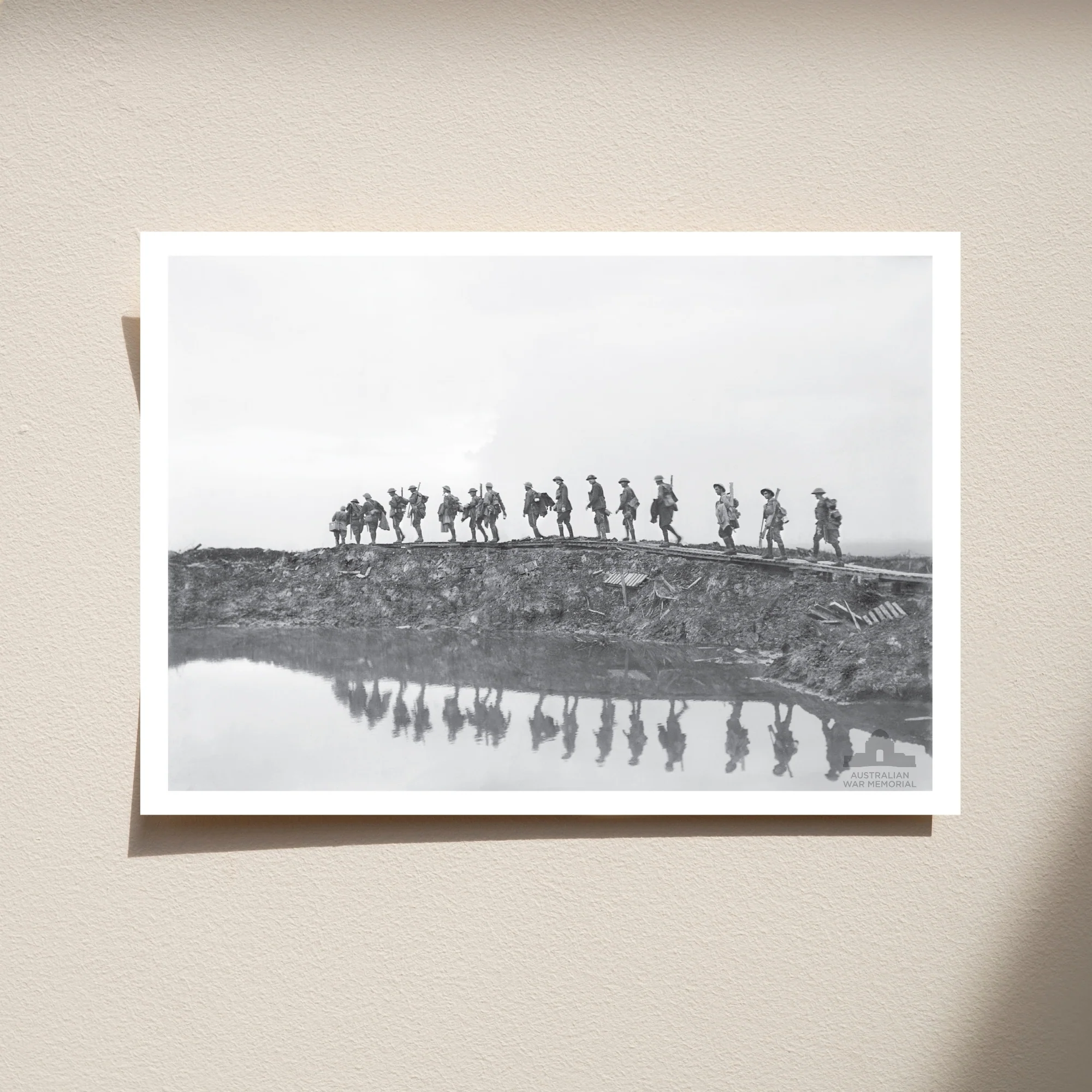 Postcard: 1st Australian Division walking on a duckboard track